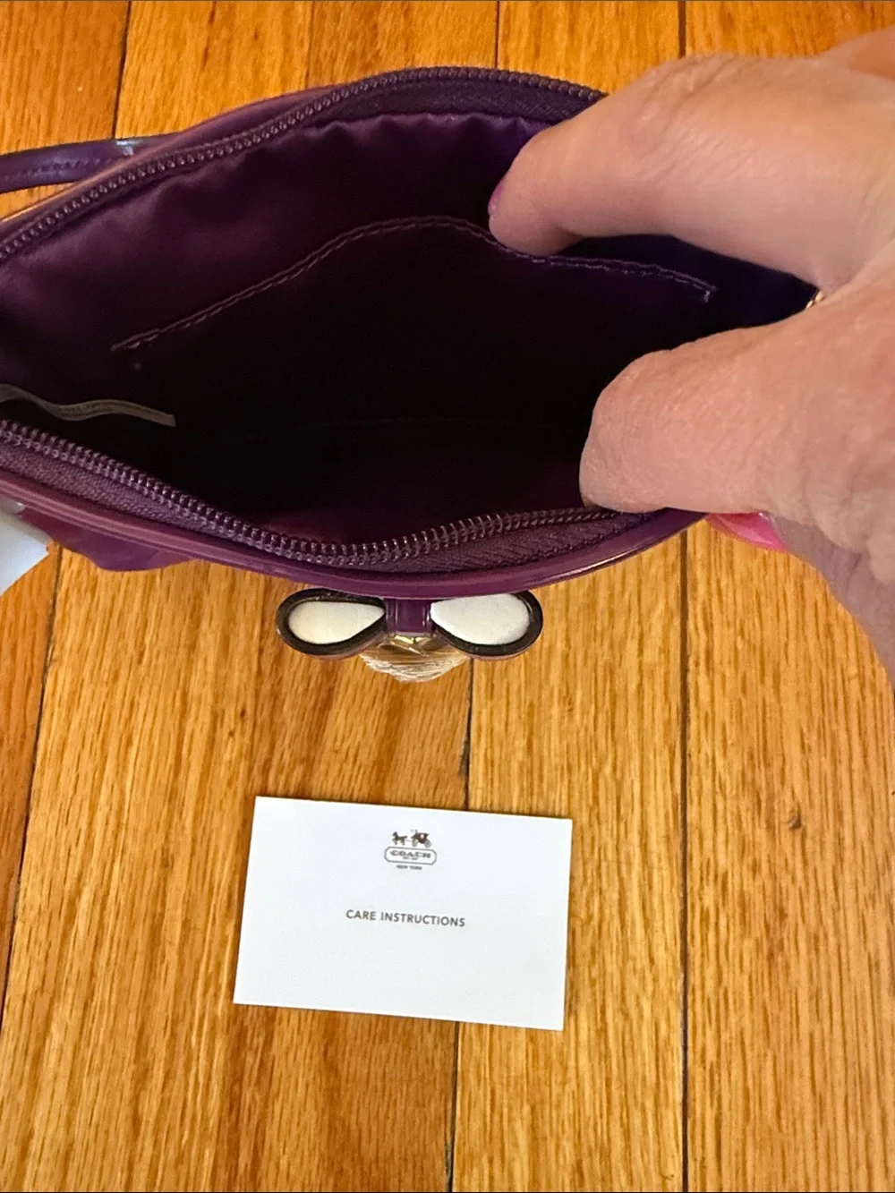 Coach Patent Purple Wristlet with Gold Heart Charm